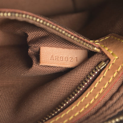 Louis Vuitton Monogram Trotteur 7 of 18