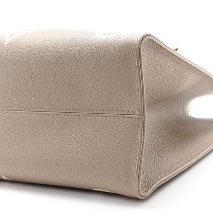 Louis Vuitton Empreinte Monogram Giant Onthego MM Tourterelle Creme 8 of 8