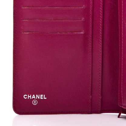 Chanel Lambskin Camellia Embossed Yen Wallet Fuchsia 6 of 11