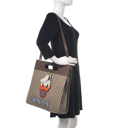Gucci X DISNEY Soft GG Supreme Monogram Donald Duck Slip Handle Vertical Tote Beige New Acero 2 of 10