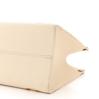 Louis Vuitton Empreinte Monogram Giant By The Pool Onthego MM Cream Saffron 9 of 12