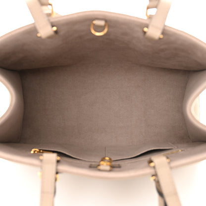 Louis Vuitton Empreinte Monogram Giant Onthego MM Tourterelle Creme 5 of 9