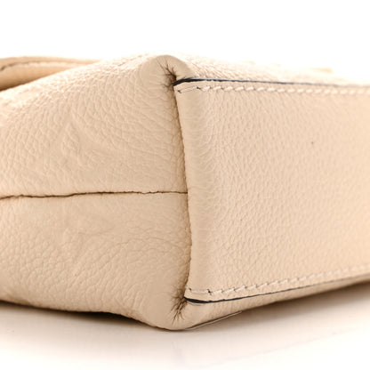 Louis Vuitton Empreinte Monogram Nano Madeleine Creme 8 of 10