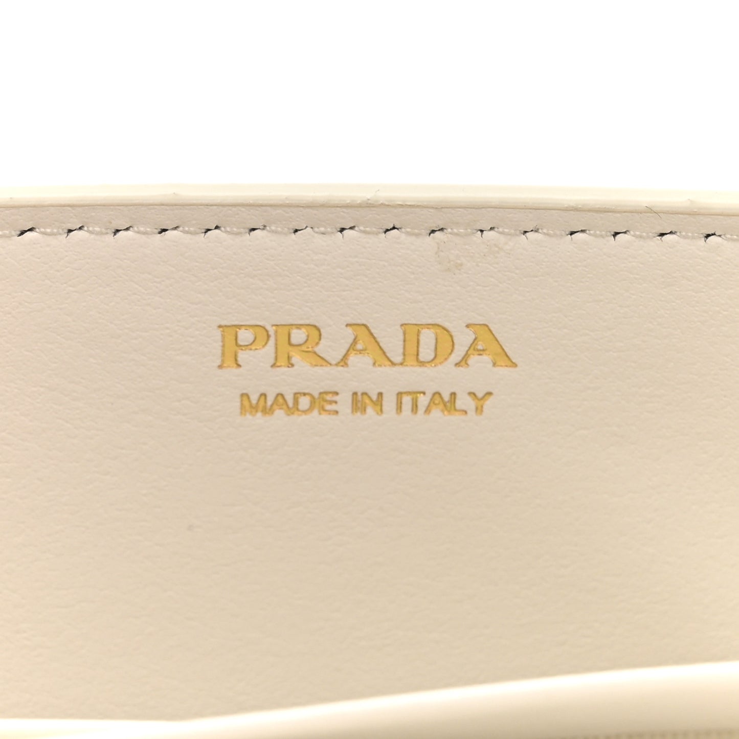 Vitello Move Triangle Logo Miniborse White