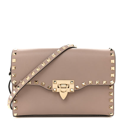 Valentino Garavani Vitello Medium Rockstud Flip Lock Crossbody Bag Poudre 1 of 9