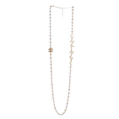 Chanel Metal Crystal Pearl 90’s Icon Logo Necklace Gold 3 of 4