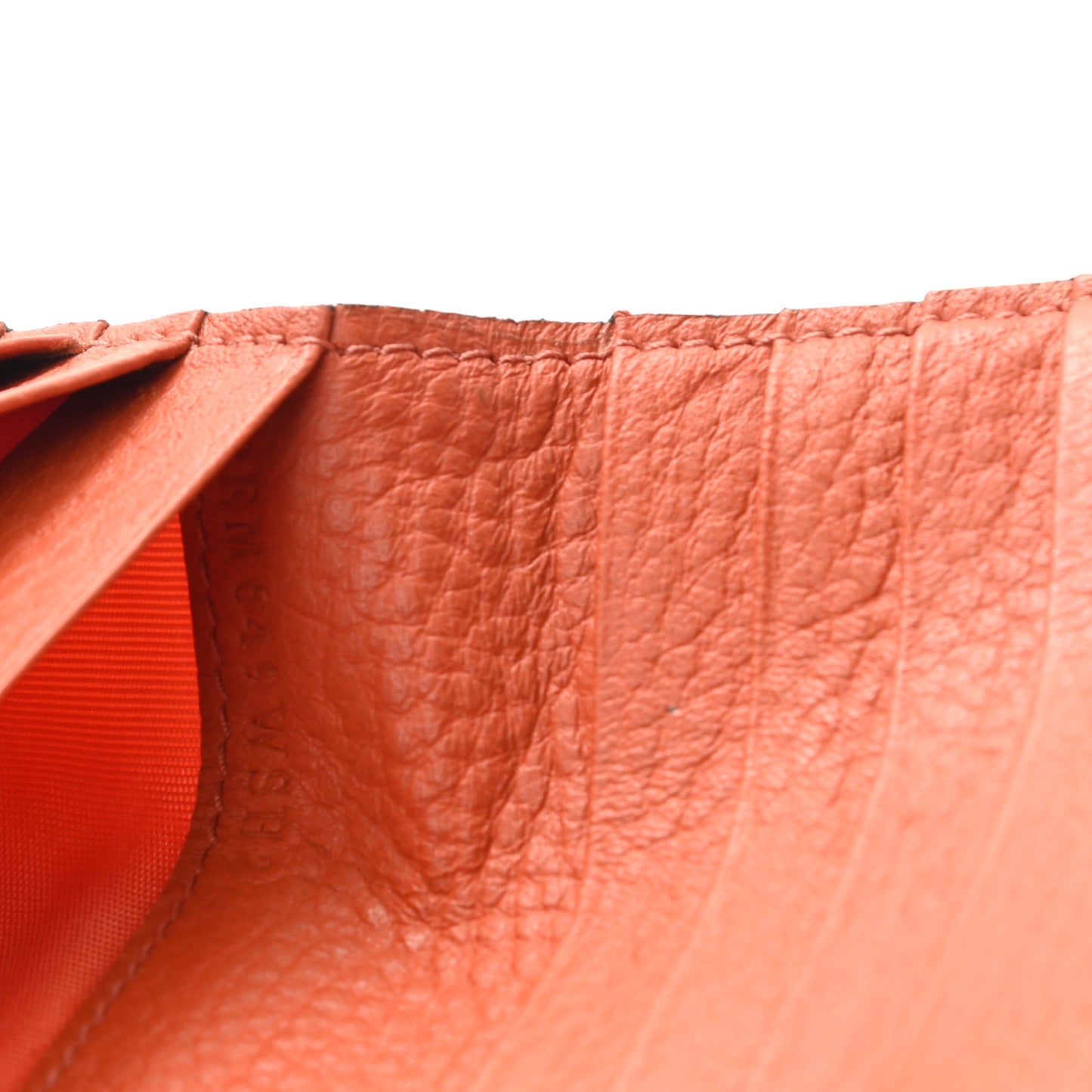Pebbled Calfskin Rockstud Compact Zip Around Wallet Orange