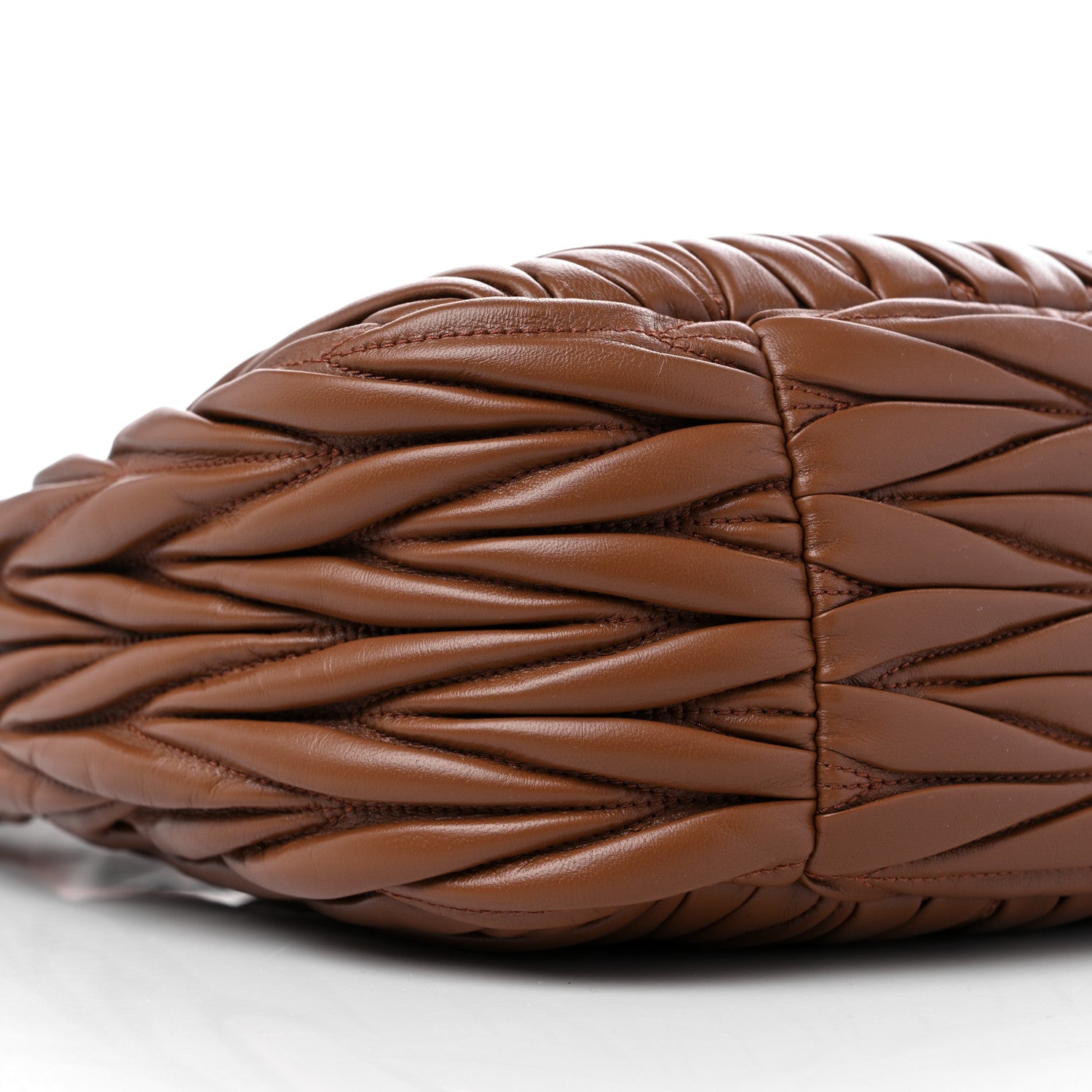 image of MIU MIU Nappa Matelasse Wander bag in size Large in the color Cognac by fashionphile