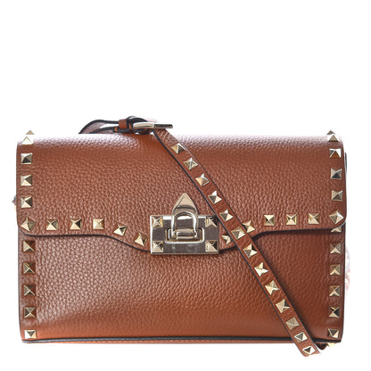 Valentino Garavani Pebbled Calfskin Medium Rockstud Flip Lock Crossbody Bag Bright Cognac 1 of 9