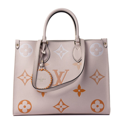 Louis Vuitton Empreinte Monogram Giant By The Pool Onthego MM Cream Saffron 1 of 4