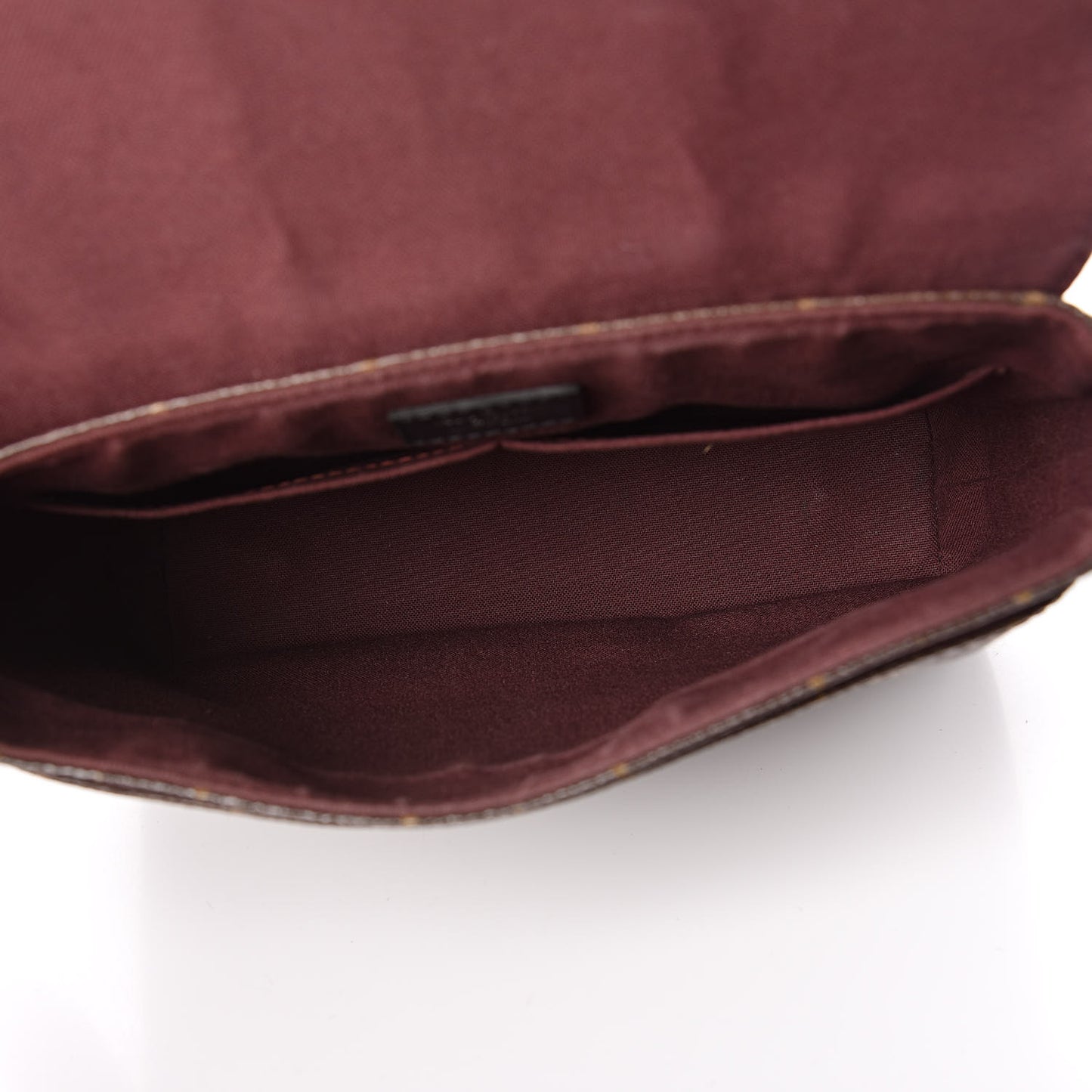 Monogram Macassar District PM