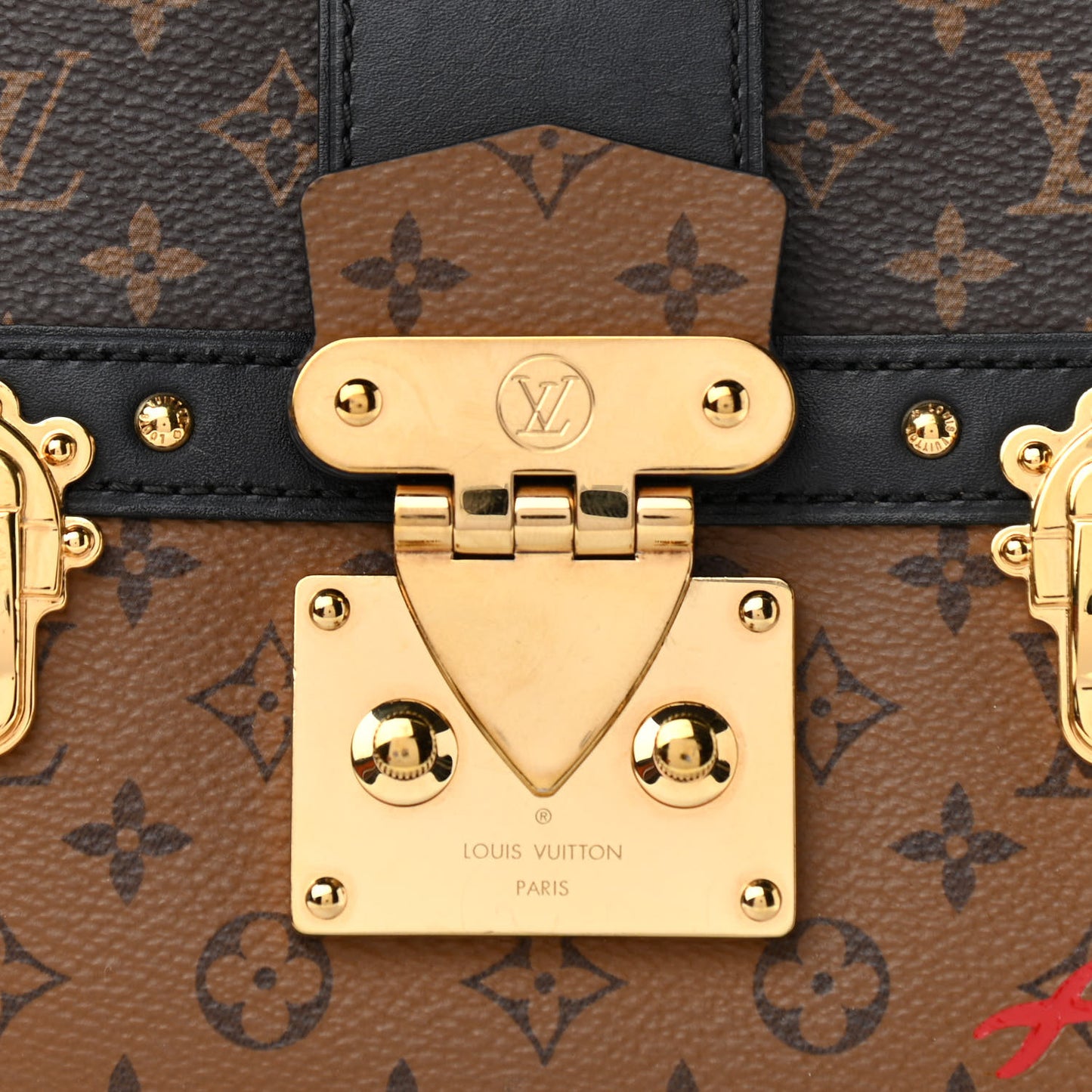 Reverse Monogram Trunk Clutch