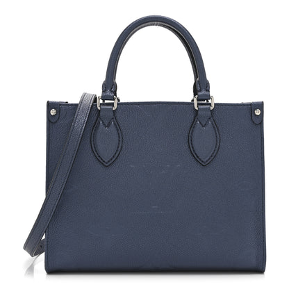 Louis Vuitton Metallic Empreinte Monogram Giant Onthego PM Navy Nacre 1 of 9