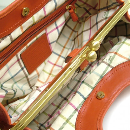 FASHIONPHILE COACHErgoLeatherPleatedFramedHoboCoral 9 of 10