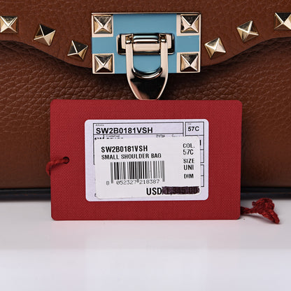 Valentino Garavani Pebbled Calfskin Medium Rockstud Flip Lock Crossbody Bag Saddle Brown 9 of 9