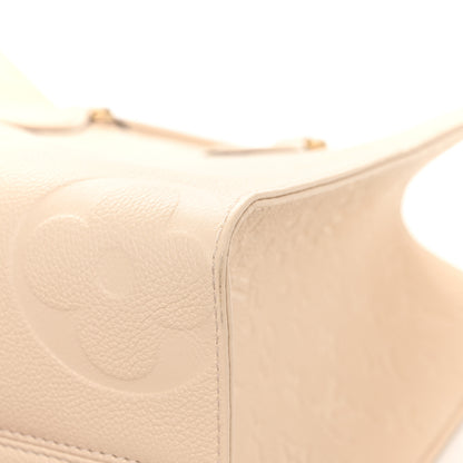 Louis Vuitton Empreinte Monogram Giant Onthego MM Creme 9 of 12