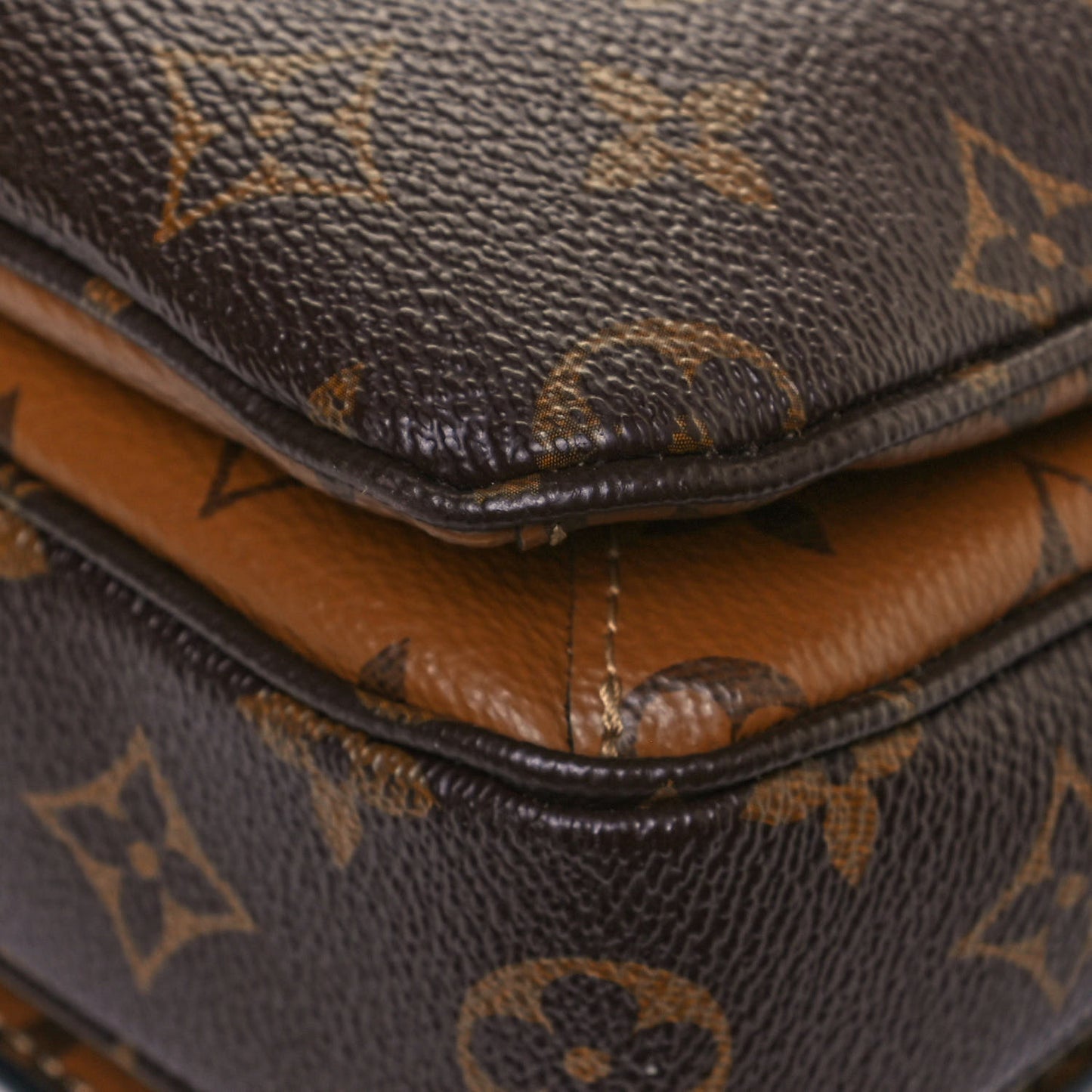 Reverse Monogram Pochette Metis