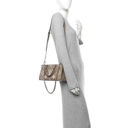 Louis Vuitton Empreinte OnTheGo East West Dove Cream 2 of 9
