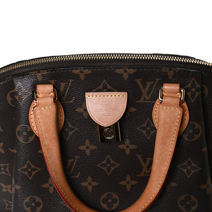 Louis Vuitton Monogram Rivoli PM 7 of 11