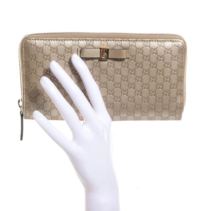Gucci Metallic Microguccissima Bow Zip Around Wallet Golden Beige 2 of 7