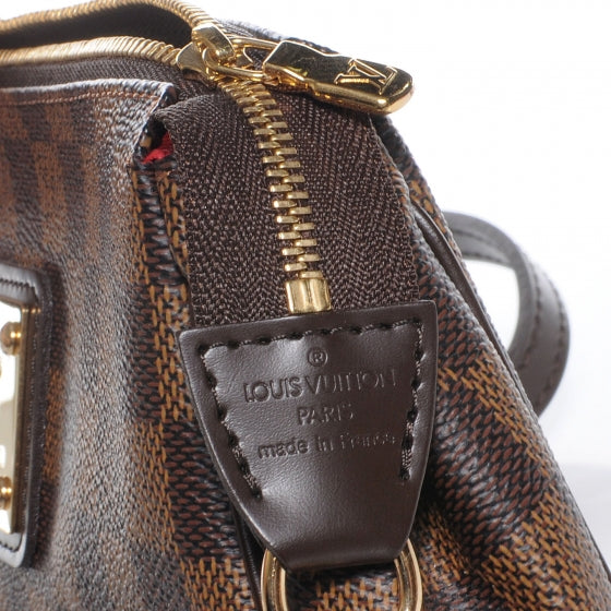 Damier Ebene Eva Clutch