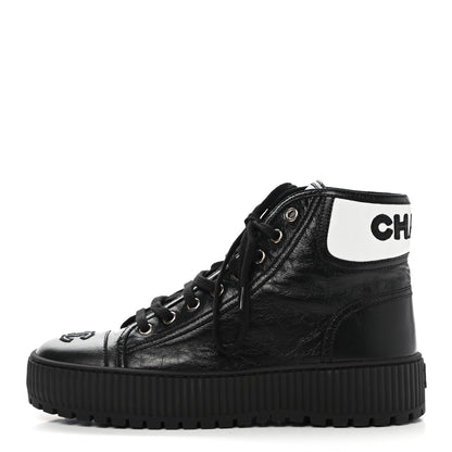 Chanel Aged Calfskin Lace Up Cap Toe Sneakers 38 Black White 1 of 8