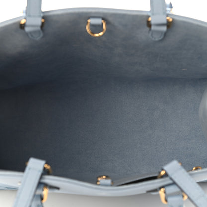 Louis Vuitton Empreinte Monogram Giant By The Pool Onthego MM Summer Blue 4 of 5