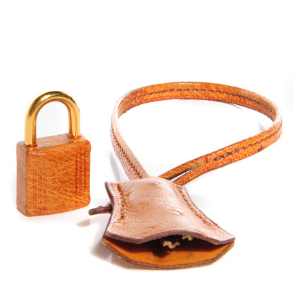 Hermes Ostrich Clochette Lock and Key Cognac 1 of 4