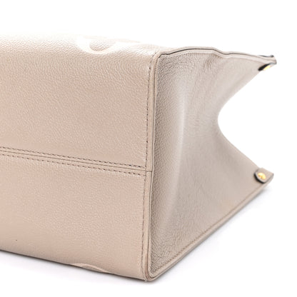 Louis Vuitton Empreinte Monogram Giant Onthego MM Tourterelle Creme 9 of 10