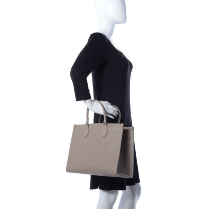 Louis Vuitton Empreinte Monogram Giant Onthego MM Tourterelle 2 of 12