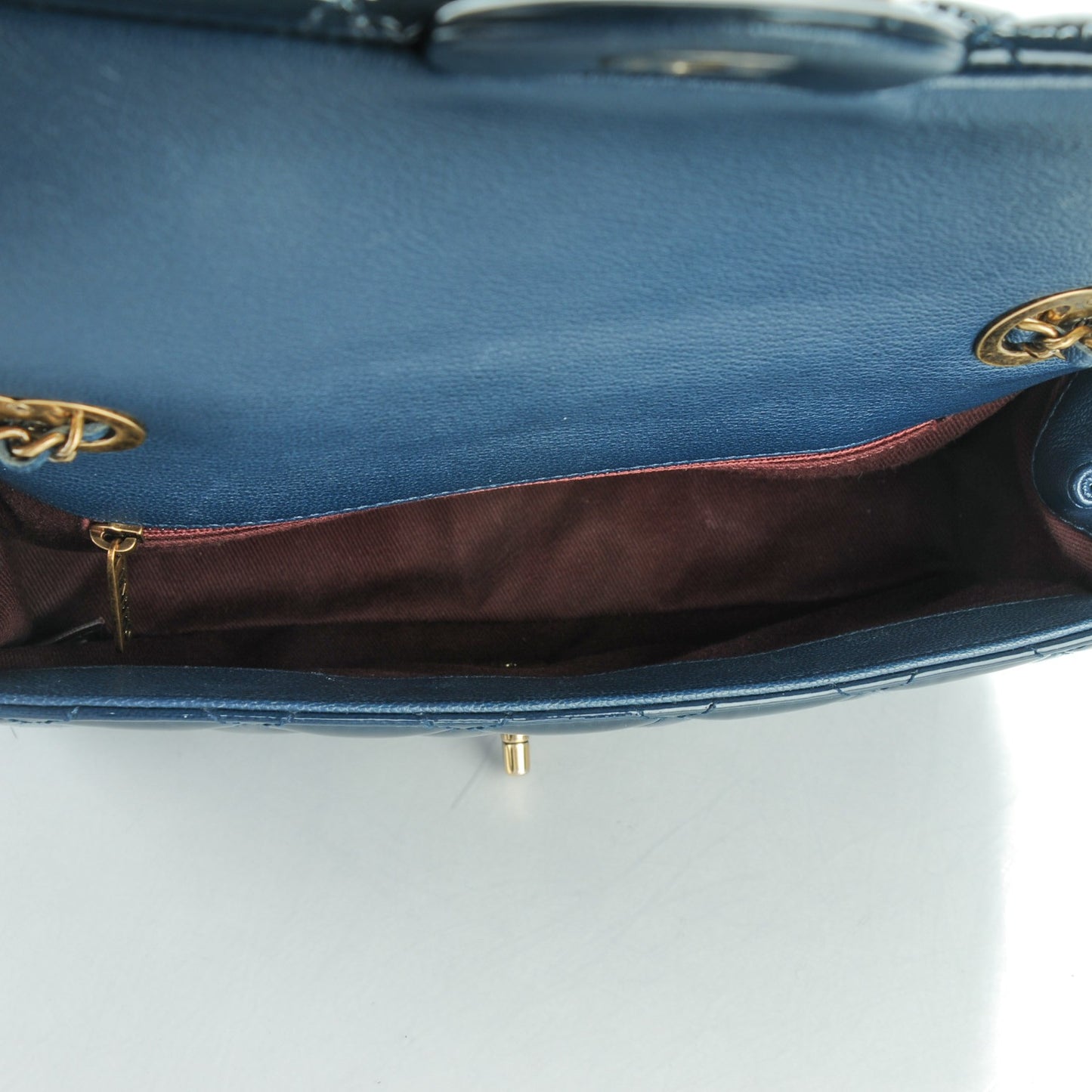 Patent Goatskin Quilted Medium CC Eyelet Flap Blue