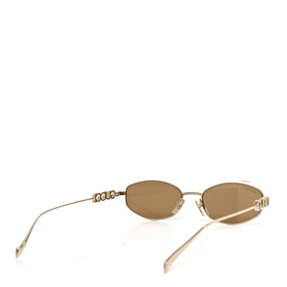 Gucci Metal Logo Oval Sunglasses GG1802S Gold 4 of 8