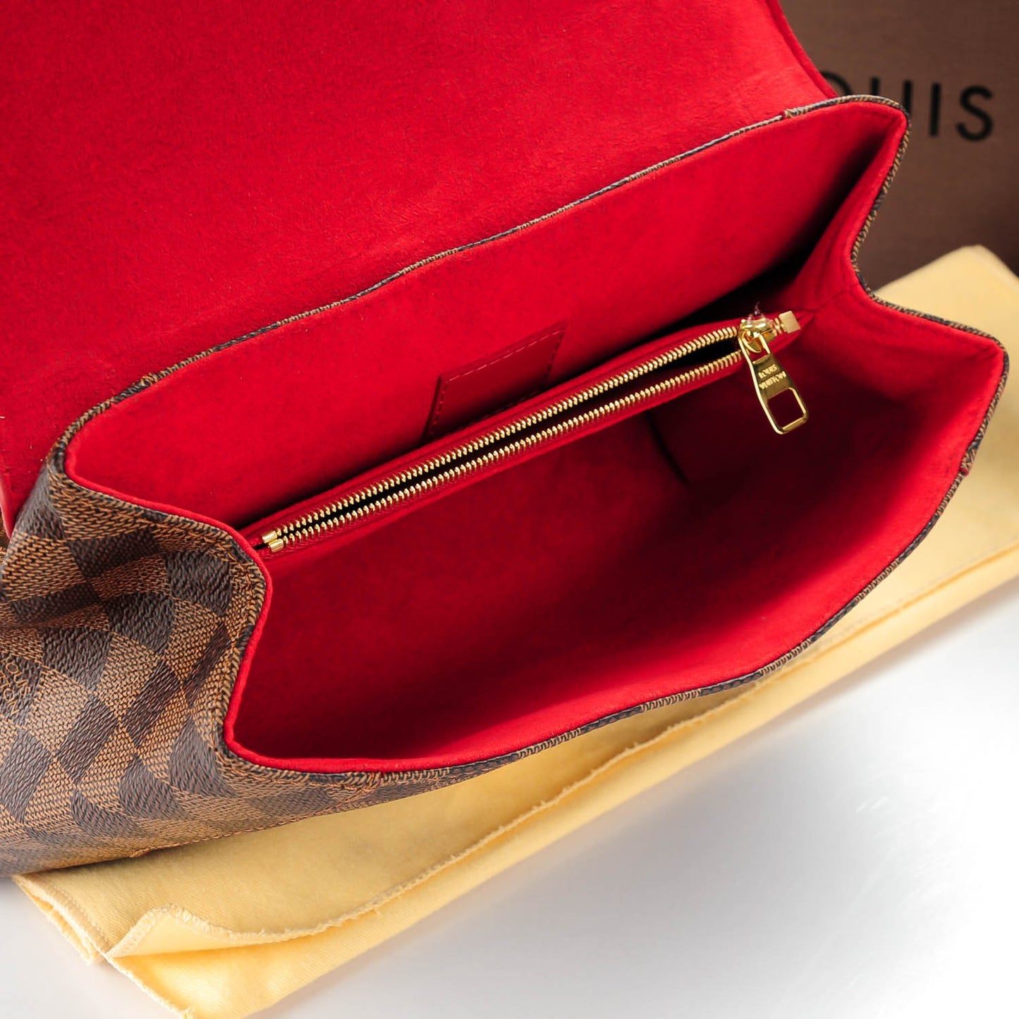 Damier Ebene Caissa Clutch Cherry