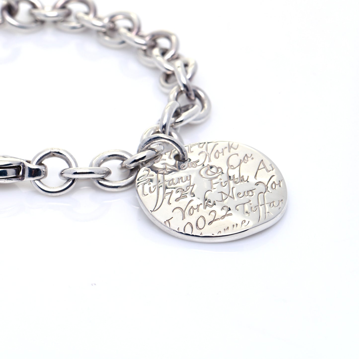 Sterling Silver Notes Round Tag Charm Bracelet