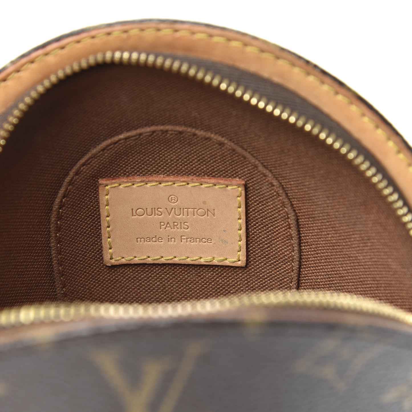 Monogram Mini Ellipse Wristlet Clutch