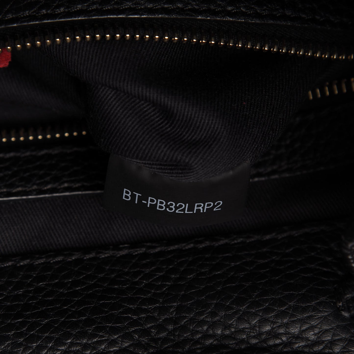 Pebbled Calfskin Rockstud Drawstring Backpack Black