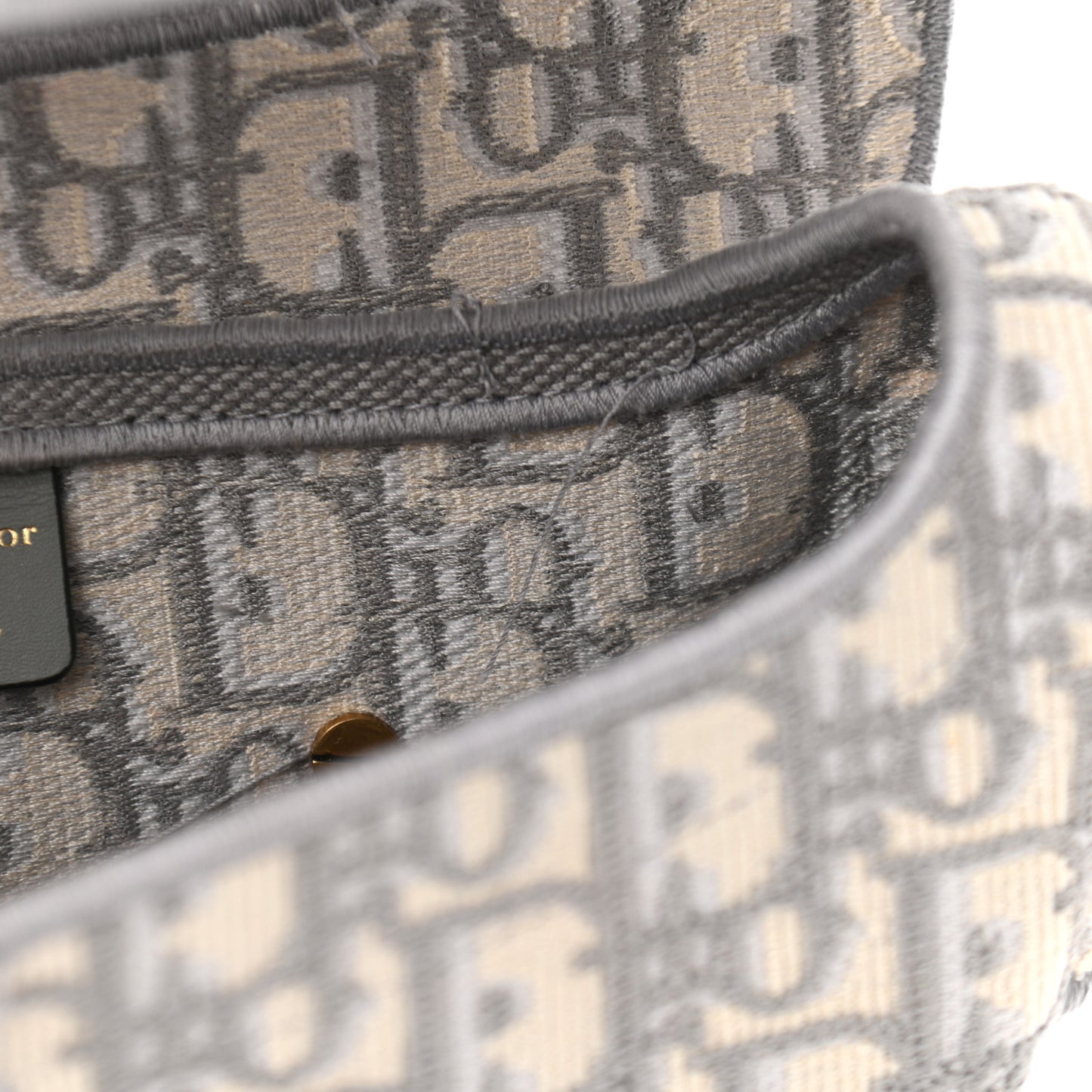 Oblique Embroidered Saddle Bag Gray