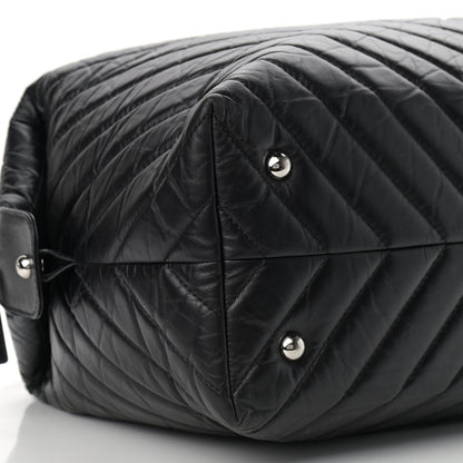 Chanel Aged Calfskin Chevron Quilted Duffle Bag Black 8 of 15