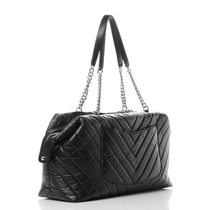 Chanel Aged Calfskin Chevron Quilted Duffle Bag Black 3 of 12