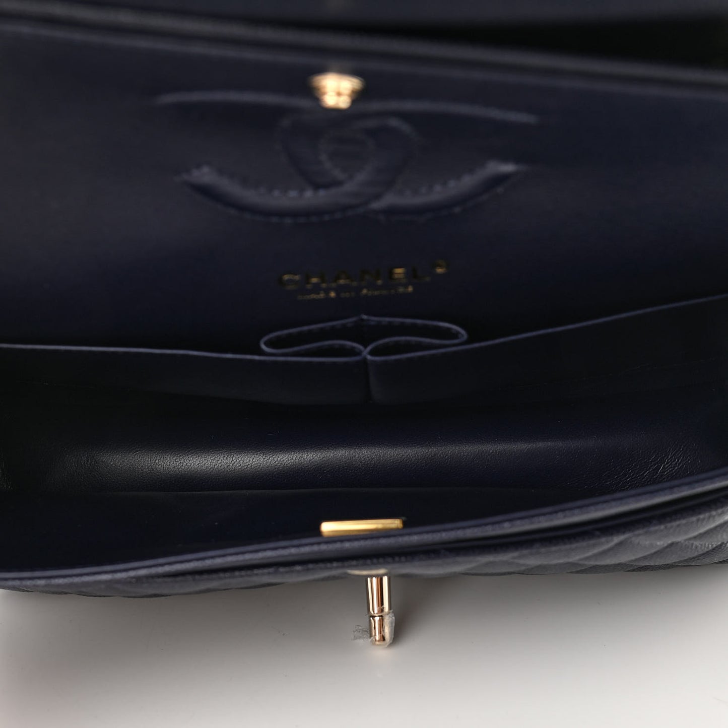 Caviar Quilted Medium Double Flap Dark Blue
