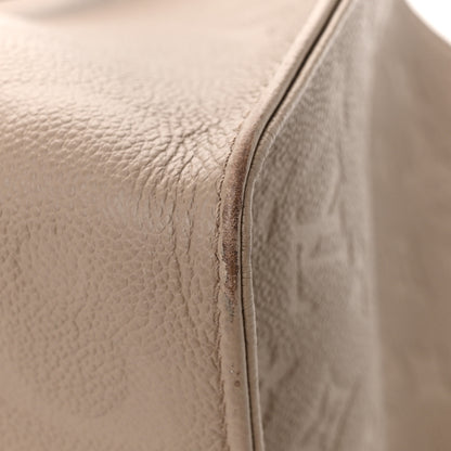Louis Vuitton Empreinte Monogram Giant Onthego MM Tourterelle 11 of 12