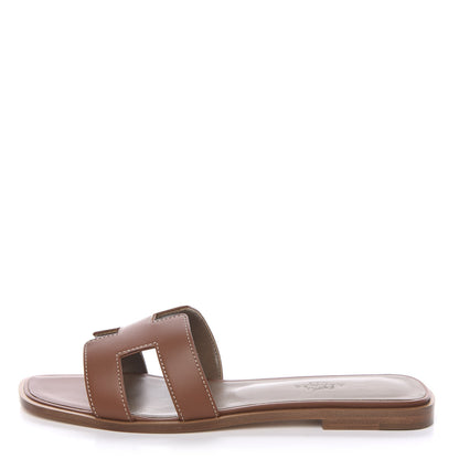 Hermes Box Calfskin Oran Sandals 37.5 Gold 1 of 9