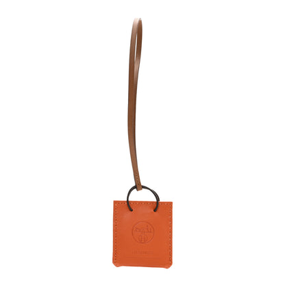 Hermes Milo Lambskin Swift Shopping Bag Charm Feu Gold 1 of 3