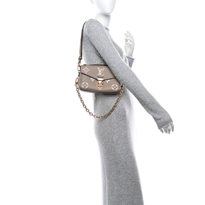 Louis Vuitton Empreinte Monogram Giant Pochette Metis East West Tourterelle Creme 2 of 9