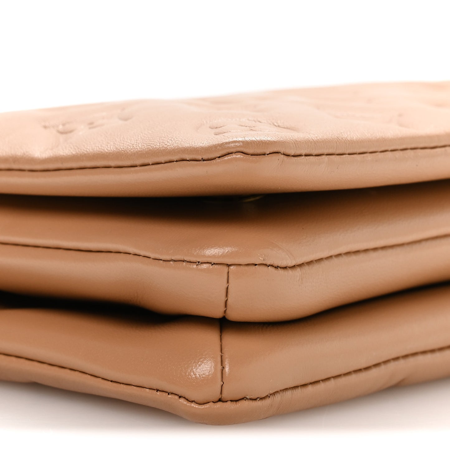 Lambskin Embossed Monogram Pochette Coussin Camel