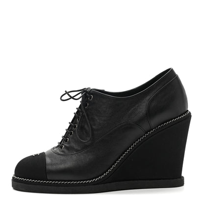 Chanel Metallic Lambskin Grosgrain Cap Toe Lace Up Wedge Booties 37 Black 1 of 7