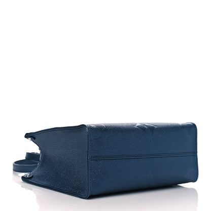 Louis Vuitton Metallic Empreinte Monogram Giant Onthego PM Navy Nacre 4 of 9