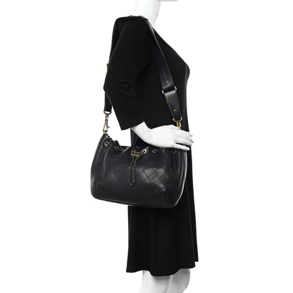 Chanel Calfskin Stitched Small Paris Rome Drawstring CC Bag Black 2 of 19