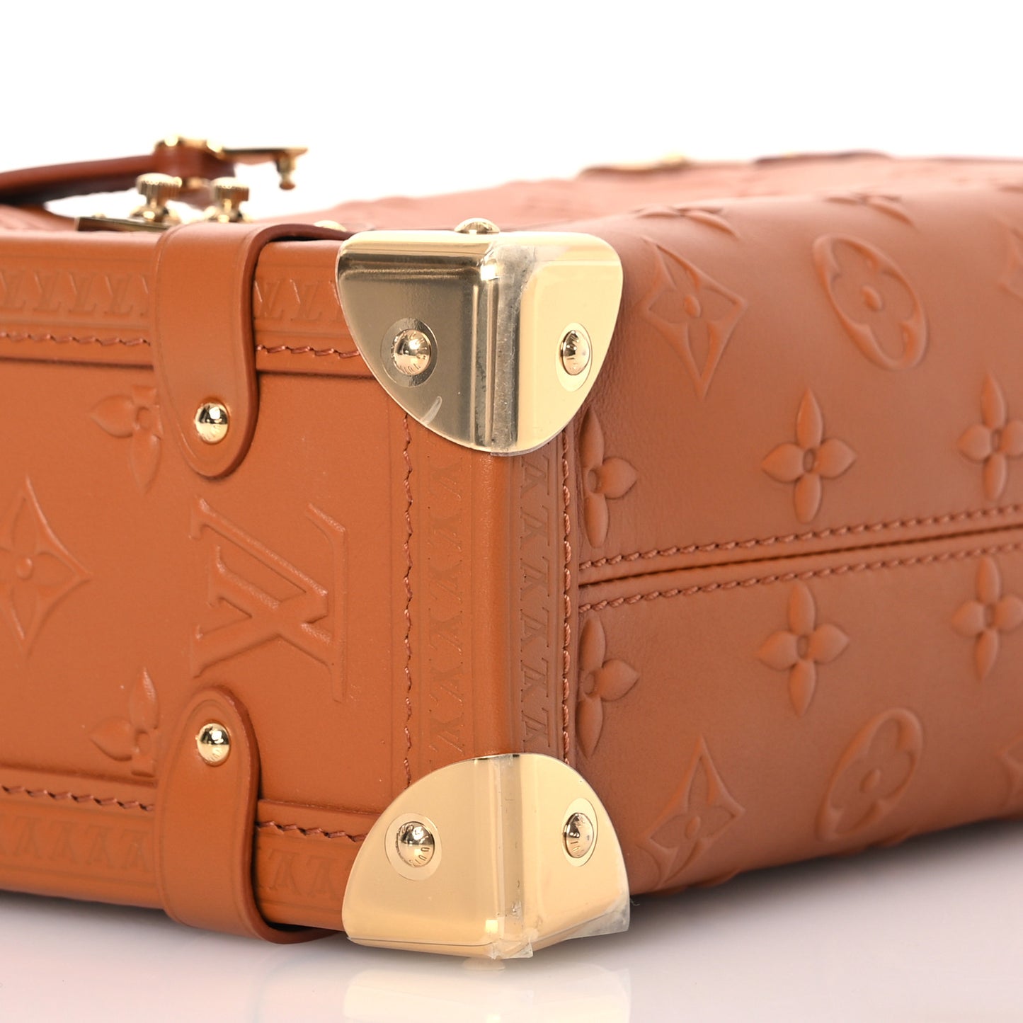 Calfskin Debossed Monogram Side Trunk Tan