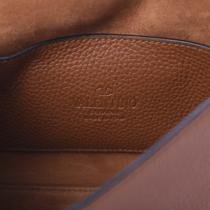 Valentino Garavani Pebbled Calfskin Medium Rockstud Flip Lock Crossbody Bag Saddle Brown 5 of 9